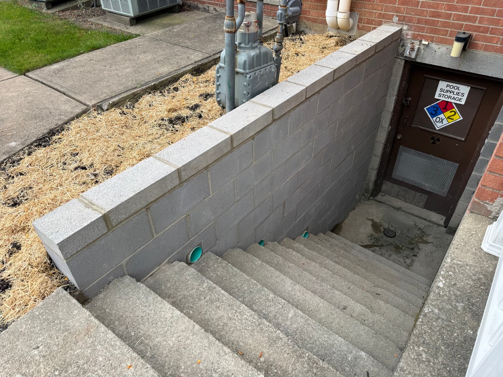 Commercial masonry restoration — apartment wall rebuild in Cleveland