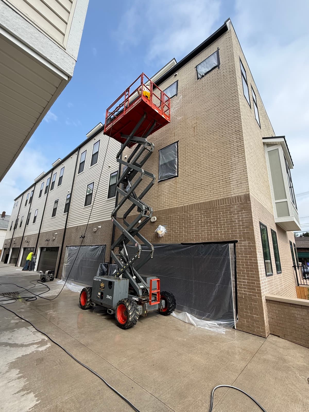 Apartment masonry wash and rust removal